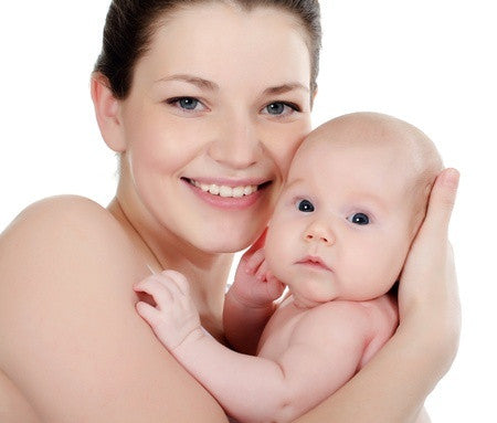 Image of woman holding a baby.