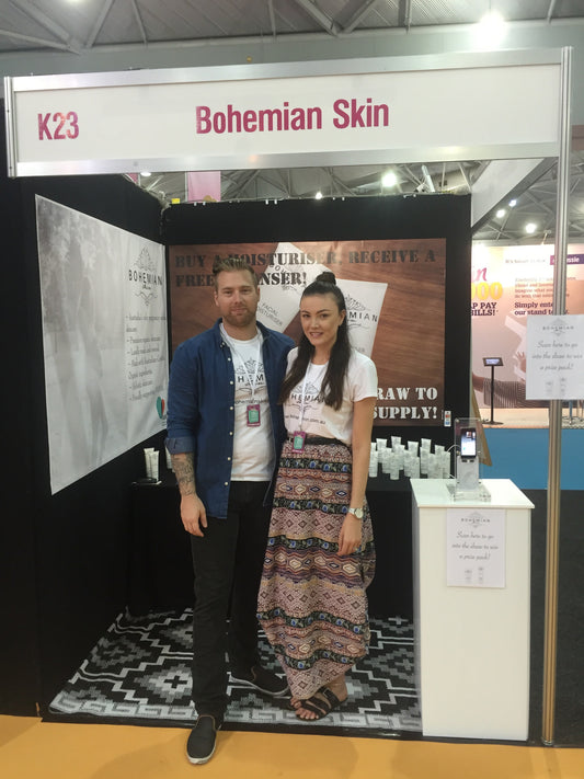 Image of Bohemian Skin Expo stand with the founders at the front.